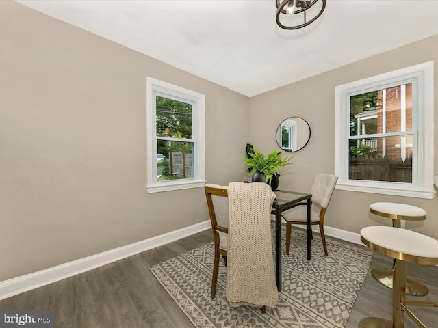 8709 Bradford Rd, Silver Spring, MD 20901 - dining area featuring dark wood-type flooring, baseboards, and plenty of natural light
