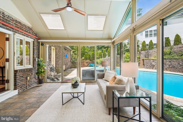 9101 Sligo Creek Pkwy, Silver Spring, MD 20901 - sunroom / solarium with brick wall, healthy amount of natural light, ceiling fan, lofted ceiling, and baseboard heating