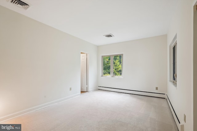 9101 Sligo Creek Pkwy, Silver Spring, MD 20901 - unfurnished room with a baseboard radiator and light carpet