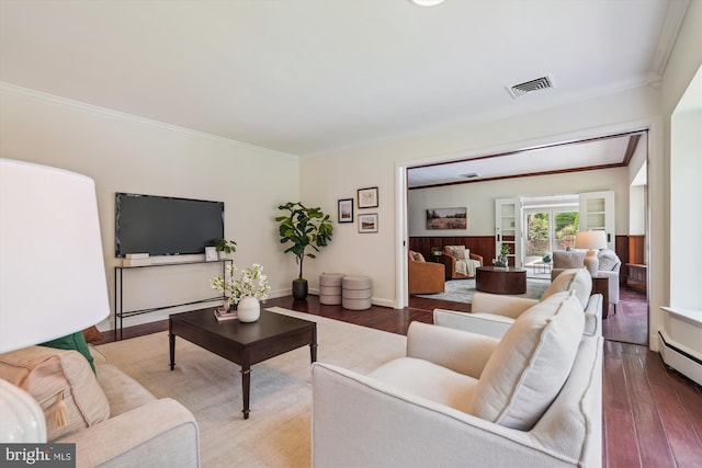 9101 Sligo Creek Pkwy, Silver Spring, MD 20901 - living room featuring crown molding, wood finished floors, and baseboard heating