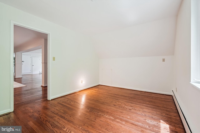 9101 Sligo Creek Pkwy, Silver Spring, MD 20901 - bonus room with baseboard heating, wood finished floors, and lofted ceiling