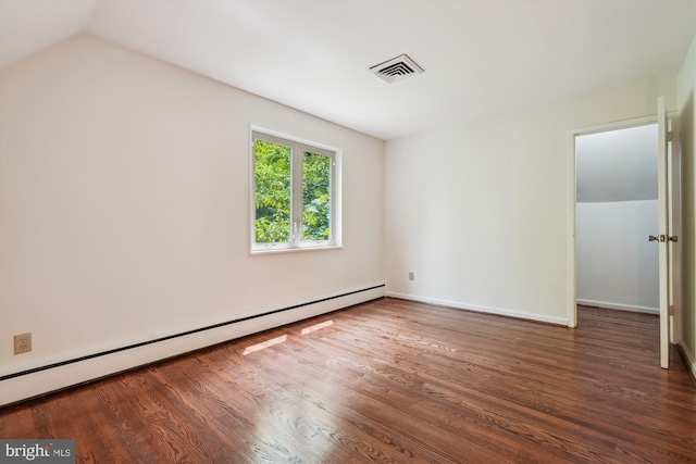 9101 Sligo Creek Pkwy, Silver Spring, MD 20901 - unfurnished bedroom featuring baseboard heating and wood finished floors