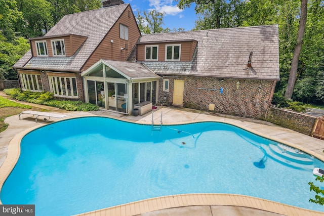 9101 Sligo Creek Pkwy, Silver Spring, MD 20901 - view of pool with a sunroom and a patio