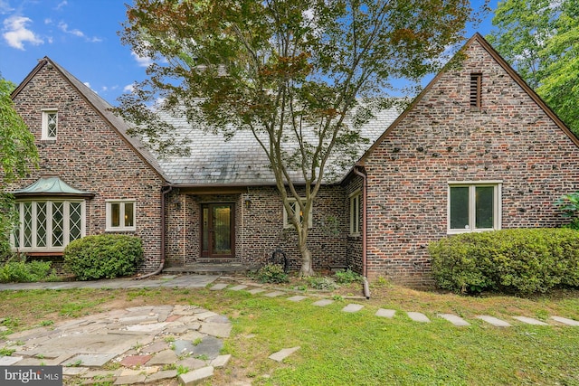 9101 Sligo Creek Pkwy, Silver Spring, MD 20901 - view of front of house with brick siding and a front yard