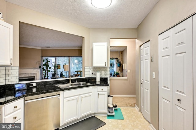 9615 Haven Farm Rd Unit 9615G, Perry Hall, MD 21128 - kitchen featuring dishwasher, white cabinets, decorative backsplash, and a textured ceiling