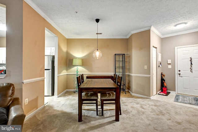 9615 Haven Farm Rd Unit 9615G, Perry Hall, MD 21128 - dining room with light colored carpet, crown molding, and a textured ceiling