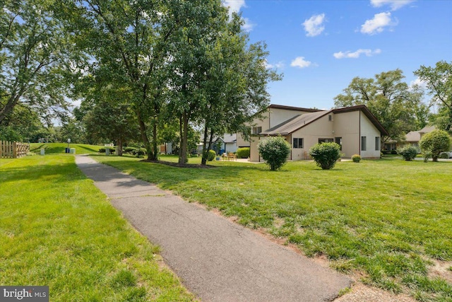 167 S Fox Rd, Sterling, VA 20164 - exterior space featuring a lawn and stucco siding