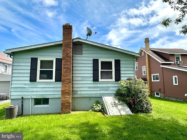 1609 Powell Ave, Hyde, PA 16843 - rear view of property featuring a yard and cooling unit