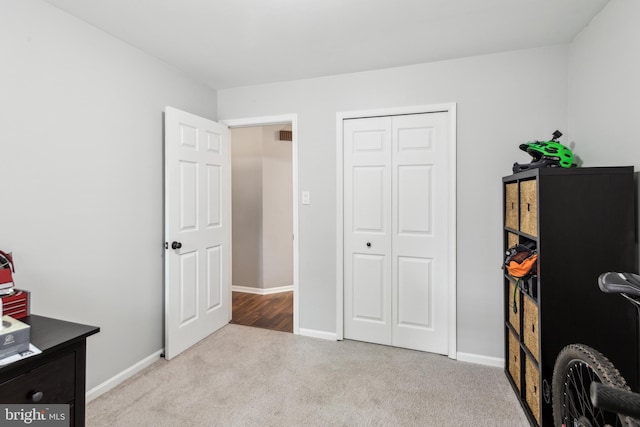 169 Woodlake Dr, Marlton, NJ 08053 - bedroom with carpet, baseboards, and a closet