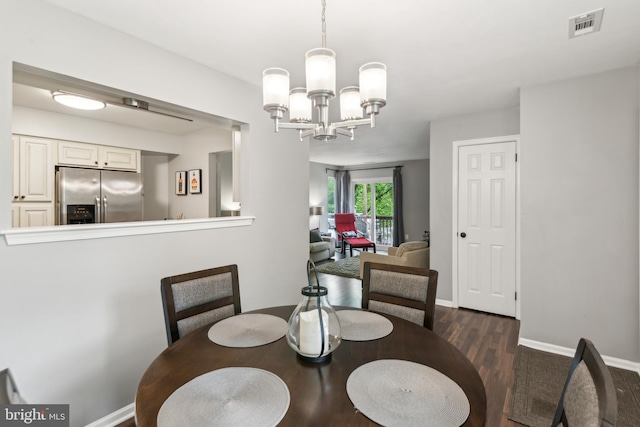 169 Woodlake Dr, Marlton, NJ 08053 - dining room with dark wood-type flooring, baseboards, and a chandelier