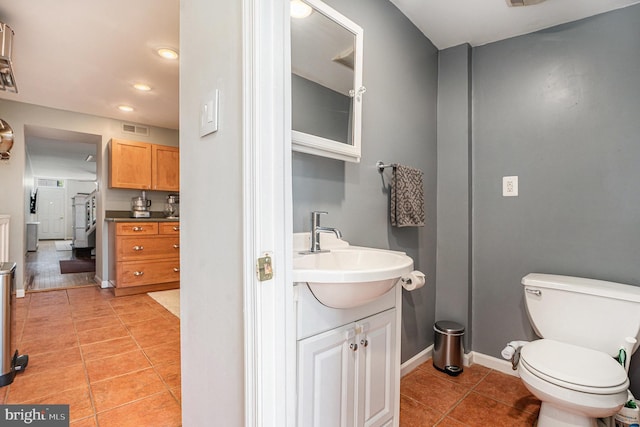 126 Ford St, Conshohocken, PA 19428 - bathroom featuring tile patterned floors, vanity, toilet, baseboards, and recessed lighting