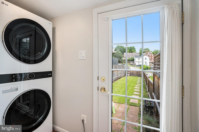 126 Ford St, Conshohocken, PA 19428 - washroom with stacked washer / dryer and baseboards