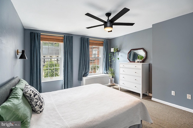 126 Ford St, Conshohocken, PA 19428 - carpeted bedroom with multiple windows, baseboards, and a ceiling fan