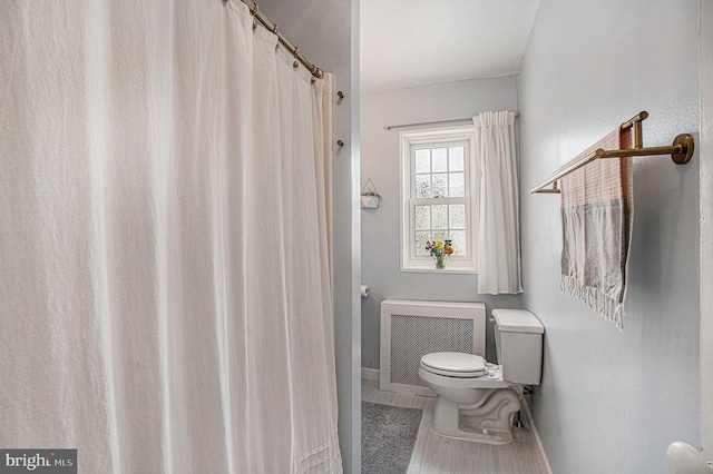 126 Ford St, Conshohocken, PA 19428 - full bathroom featuring radiator heating unit, toilet, and baseboards