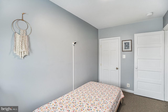 126 Ford St, Conshohocken, PA 19428 - bedroom featuring dark colored carpet and baseboards