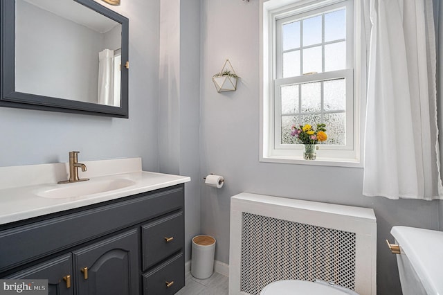 126 Ford St, Conshohocken, PA 19428 - bathroom featuring toilet, vanity, and radiator