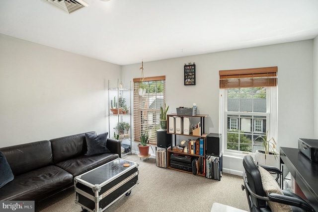 126 Ford St, Conshohocken, PA 19428 - carpeted living area featuring plenty of natural light and an office area