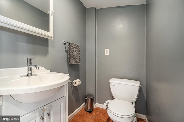 126 Ford St, Conshohocken, PA 19428 - bathroom featuring tile patterned floors, toilet, vanity, and baseboards