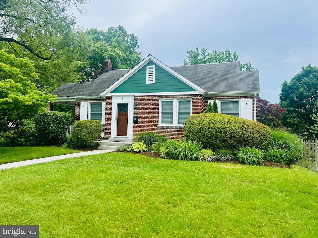 6 E Hamilton Ave, Silver Spring, MD 20901 - bungalow-style home with brick siding and a chimney