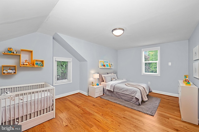 6 E Hamilton Ave, Silver Spring, MD 20901 - bedroom with wood finished floors, baseboards, and lofted ceiling