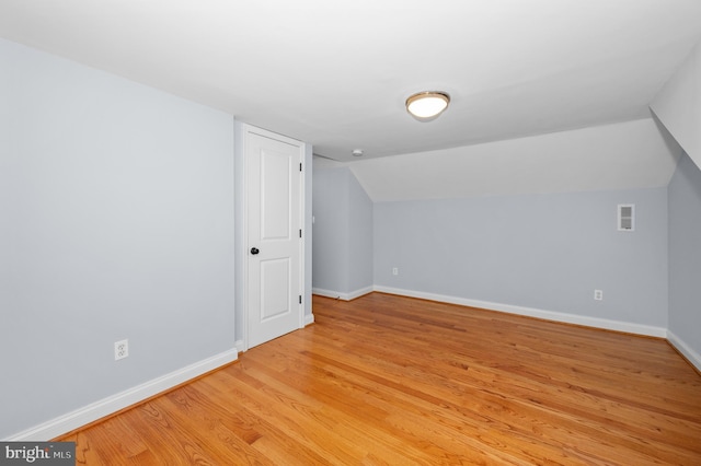 6 E Hamilton Ave, Silver Spring, MD 20901 - bonus room featuring light wood-type flooring, baseboards, and lofted ceiling