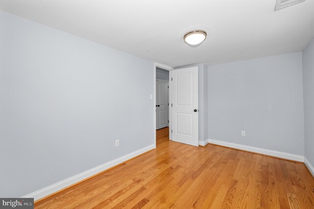6 E Hamilton Ave, Silver Spring, MD 20901 - unfurnished room with baseboards and light wood-style flooring