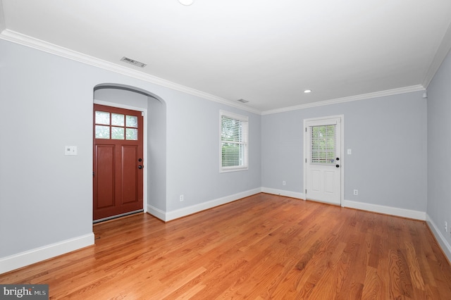 6 E Hamilton Ave, Silver Spring, MD 20901 - foyer entrance with crown molding, arched walkways, baseboards, light wood finished floors, and recessed lighting