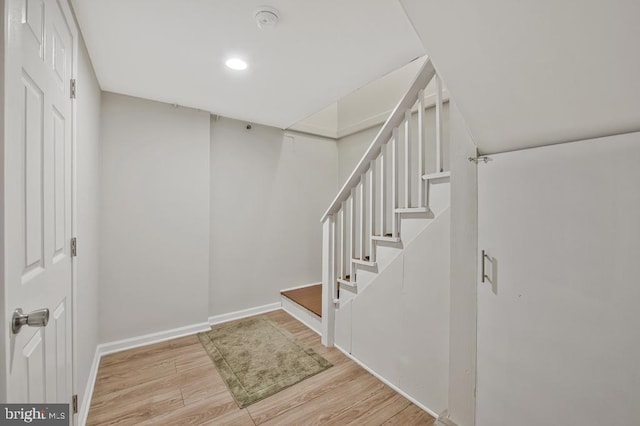 11008 Madison St, Kensington, MD 20895 - stairway featuring wood finished floors, baseboards, and recessed lighting