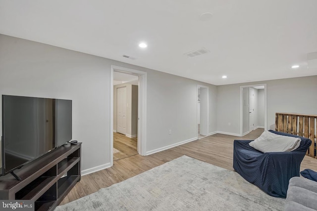 11008 Madison St, Kensington, MD 20895 - sitting room with wood finished floors, baseboards, and recessed lighting