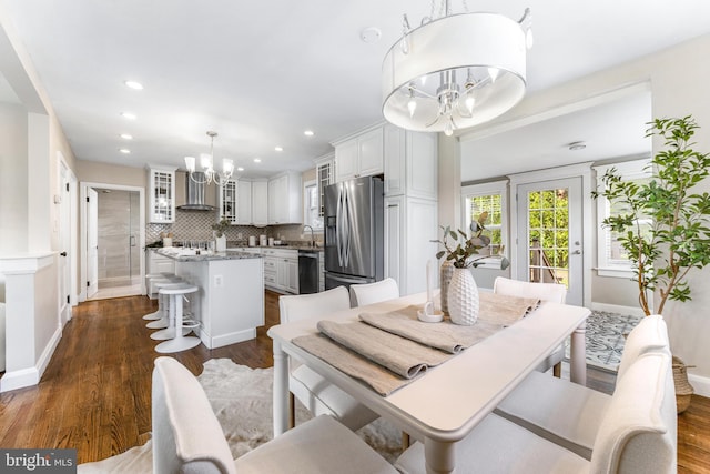 10510 Vincent Rd, White Marsh, MD 21162 - dining room with a chandelier, dark wood-style flooring, and recessed lighting