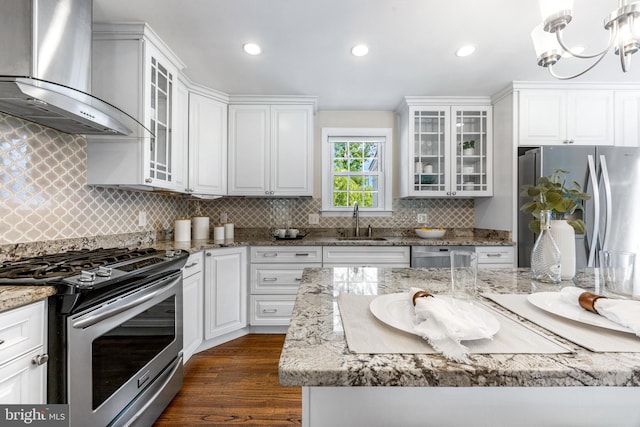 10510 Vincent Rd, White Marsh, MD 21162 - kitchen featuring appliances with stainless steel finishes, wall chimney exhaust hood, recessed lighting, white cabinetry, and dark wood-style flooring