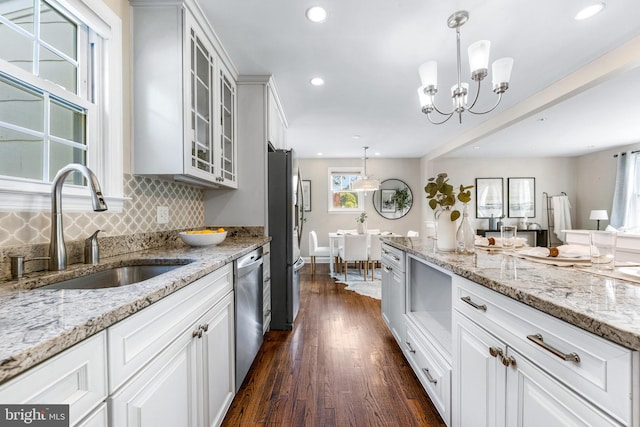 10510 Vincent Rd, White Marsh, MD 21162 - kitchen featuring appliances with stainless steel finishes, recessed lighting, dark wood finished floors, glass insert cabinets, and backsplash