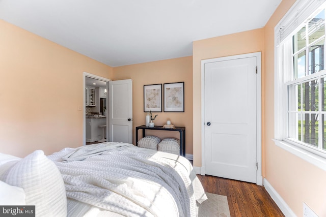 10510 Vincent Rd, White Marsh, MD 21162 - bedroom featuring dark wood-style flooring and baseboards