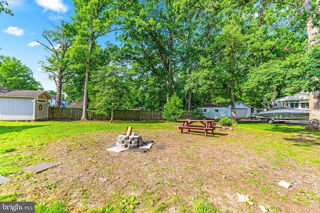 10510 Vincent Rd, White Marsh, MD 21162 - view of yard with a shed, a detached garage, and view of wooded area