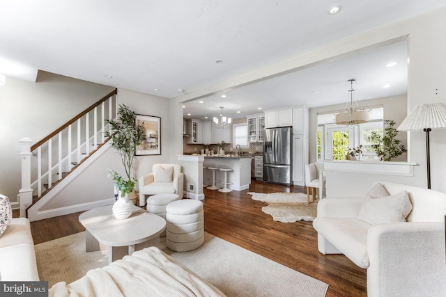 10510 Vincent Rd, White Marsh, MD 21162 - living room with a chandelier, recessed lighting, dark wood-style floors, and stairway