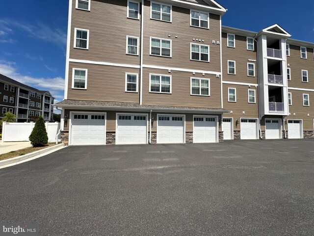 406-203 Bold Ruler Ct, Havre De Grace, MD 21078 - view of property featuring a garage and driveway