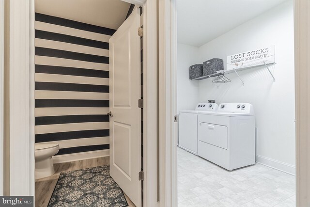 406-203 Bold Ruler Ct, Havre De Grace, MD 21078 - laundry room with washer and clothes dryer, baseboards, and light floors