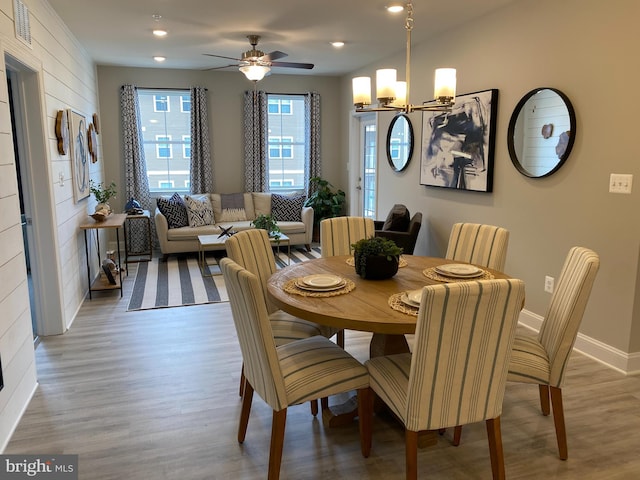 406-203 Bold Ruler Ct, Havre De Grace, MD 21078 - dining space with light wood finished floors, a chandelier, recessed lighting, a ceiling fan, and baseboards