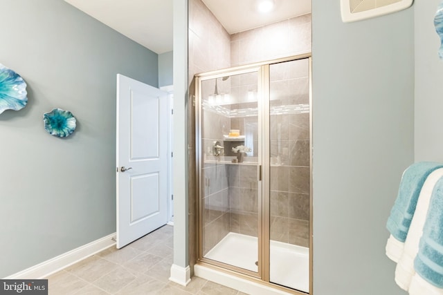 406-203 Bold Ruler Ct, Havre De Grace, MD 21078 - bathroom with a shower stall, baseboards, and tile patterned floors
