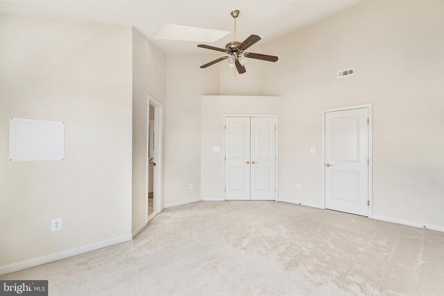9207 Cascade Falls Dr, Bristow, VA 20136 - unfurnished bedroom featuring carpet floors, high vaulted ceiling, baseboards, and a closet
