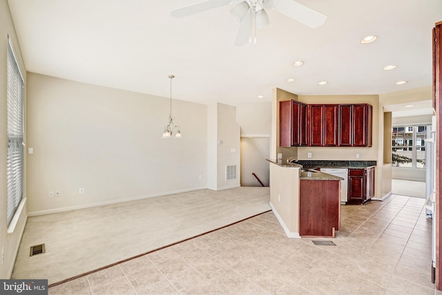 9207 Cascade Falls Dr, Bristow, VA 20136 - kitchen featuring reddish brown cabinets, light colored carpet, dishwasher, a ceiling fan, and recessed lighting