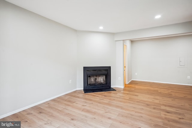 14629 Monmouth Dr Unit 10-112, Burtonsville, MD 20866 - unfurnished living room featuring light wood finished floors, recessed lighting, a fireplace, and baseboards