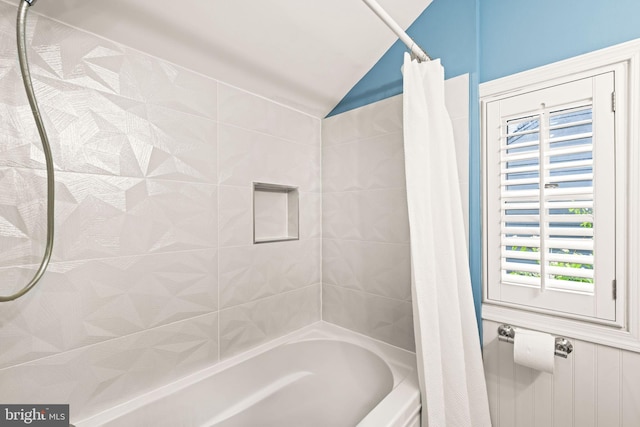 3311 Cameron Mills Rd, Alexandria, VA 22302 - bathroom with shower / bath combo with shower curtain and vaulted ceiling