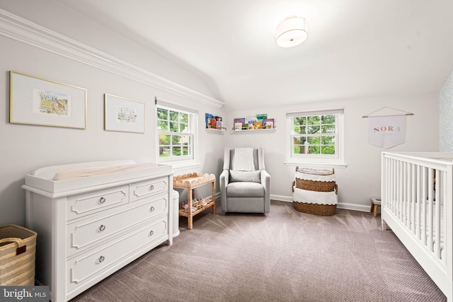 3311 Cameron Mills Rd, Alexandria, VA 22302 - bedroom featuring vaulted ceiling, a nursery area, carpet flooring, and baseboards