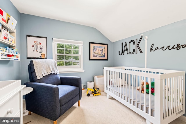 3311 Cameron Mills Rd, Alexandria, VA 22302 - carpeted bedroom featuring lofted ceiling and a nursery area