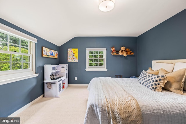 3311 Cameron Mills Rd, Alexandria, VA 22302 - carpeted bedroom featuring lofted ceiling and baseboards