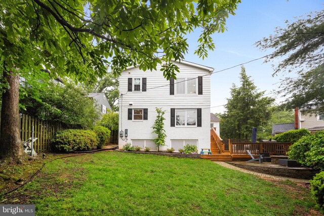 3311 Cameron Mills Rd, Alexandria, VA 22302 - back of house with a deck and stucco siding
