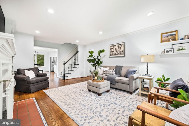 3311 Cameron Mills Rd, Alexandria, VA 22302 - living area featuring stairway, ornamental molding, recessed lighting, wood finished floors, and baseboards