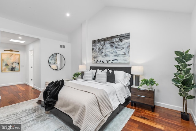 2203 Race St, Philadelphia, PA 19103 - bedroom featuring wood finished floors, vaulted ceiling, baseboards, and recessed lighting