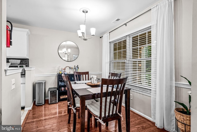 258 Tavistock, Cherry Hill, NJ 08034 - dining area featuring a chandelier and wood finished floors